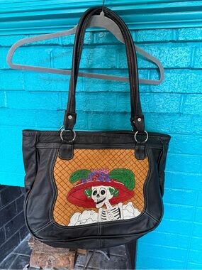 Black Shoulder Tote with Red Hat Skeleton Artwork